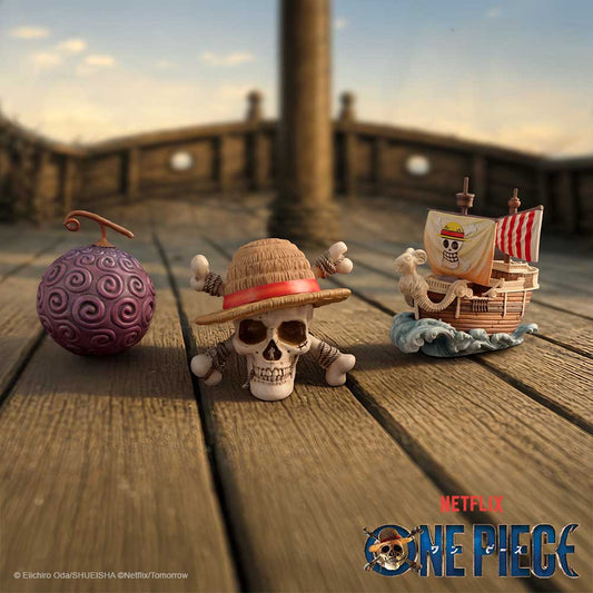 One Piece First Voyage Mini Figurines Set - three miniatures on a waterfront display with One Piece branding