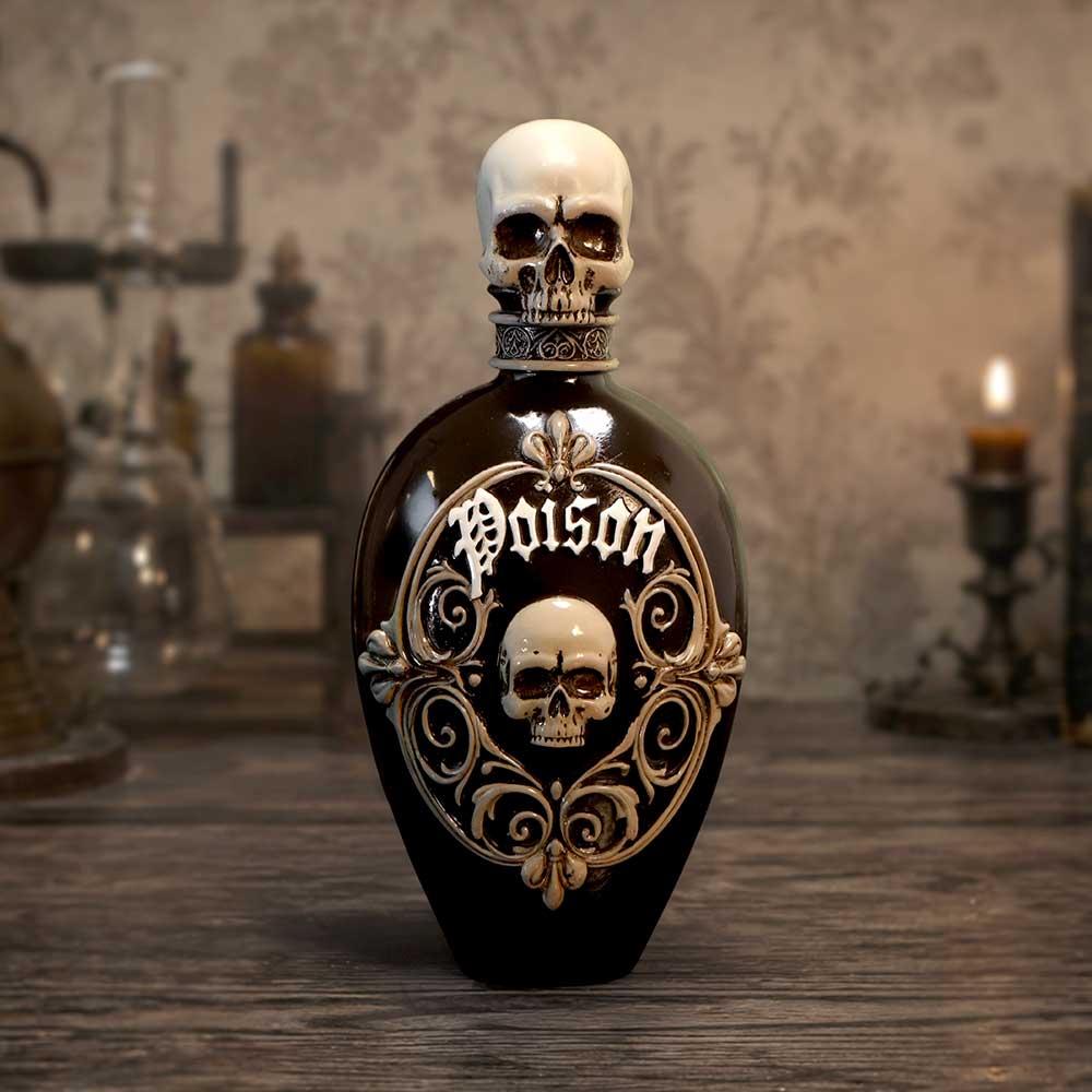 Poison Bottle Figurine - Poison figurine displayed in a gothic candlelit setting