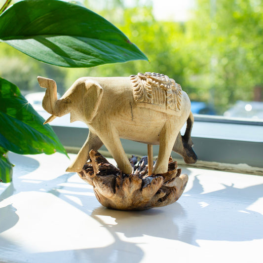 Handmade wooden elephant carving walking on natural parasite wood base rustic wildlife décor UK