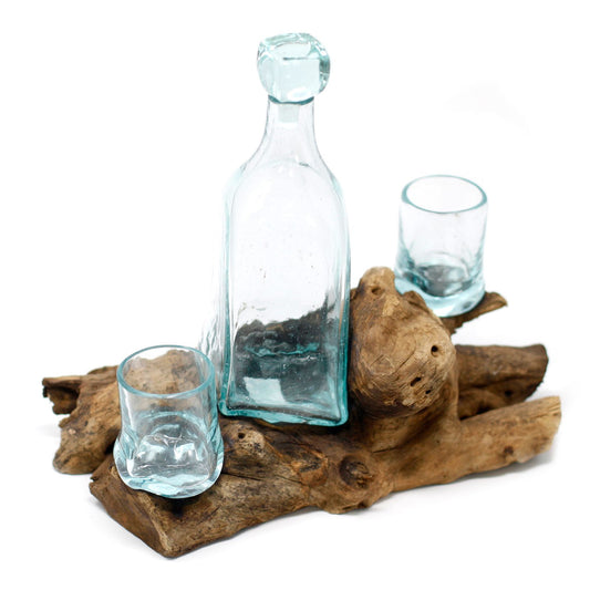 Molten glass whisky set with decanter and drinking glasses on natural gamal wood base UK