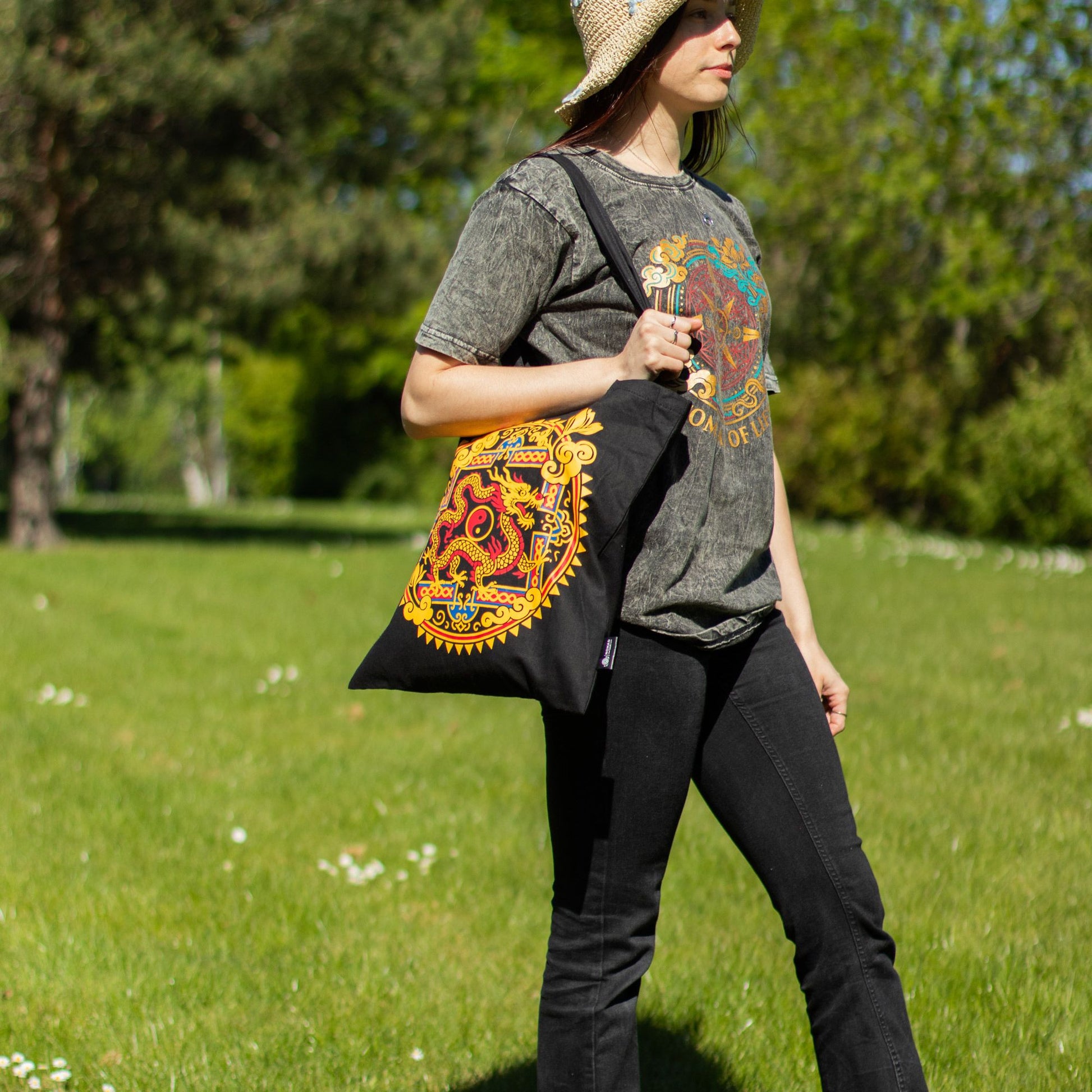 Dragon Yin & Yang black 6oz cotton tote bag featuring symbolic Eastern-inspired artwork.