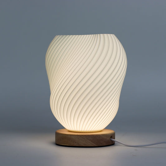 New Wave Lamp – Shell Twisted – minimalist ambient lamp with smooth finish and wood-effect base for contemporary home lighting UK