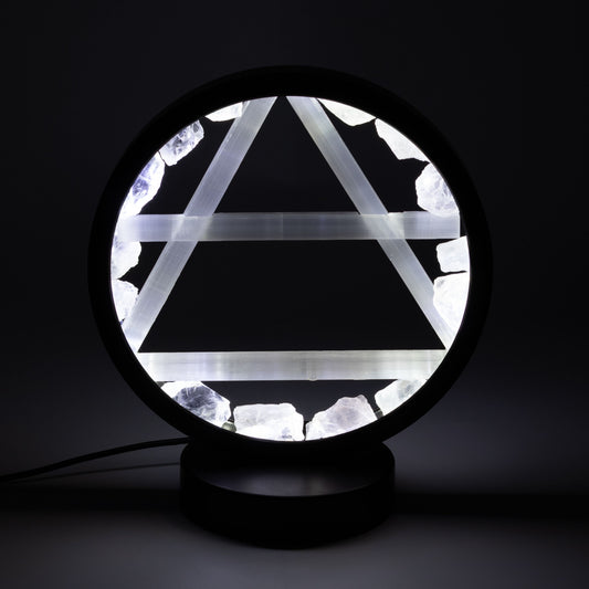 Air Gemstone Halo Lamp with clear quartz halo and selenite Air symbol illuminated on metal stand UK