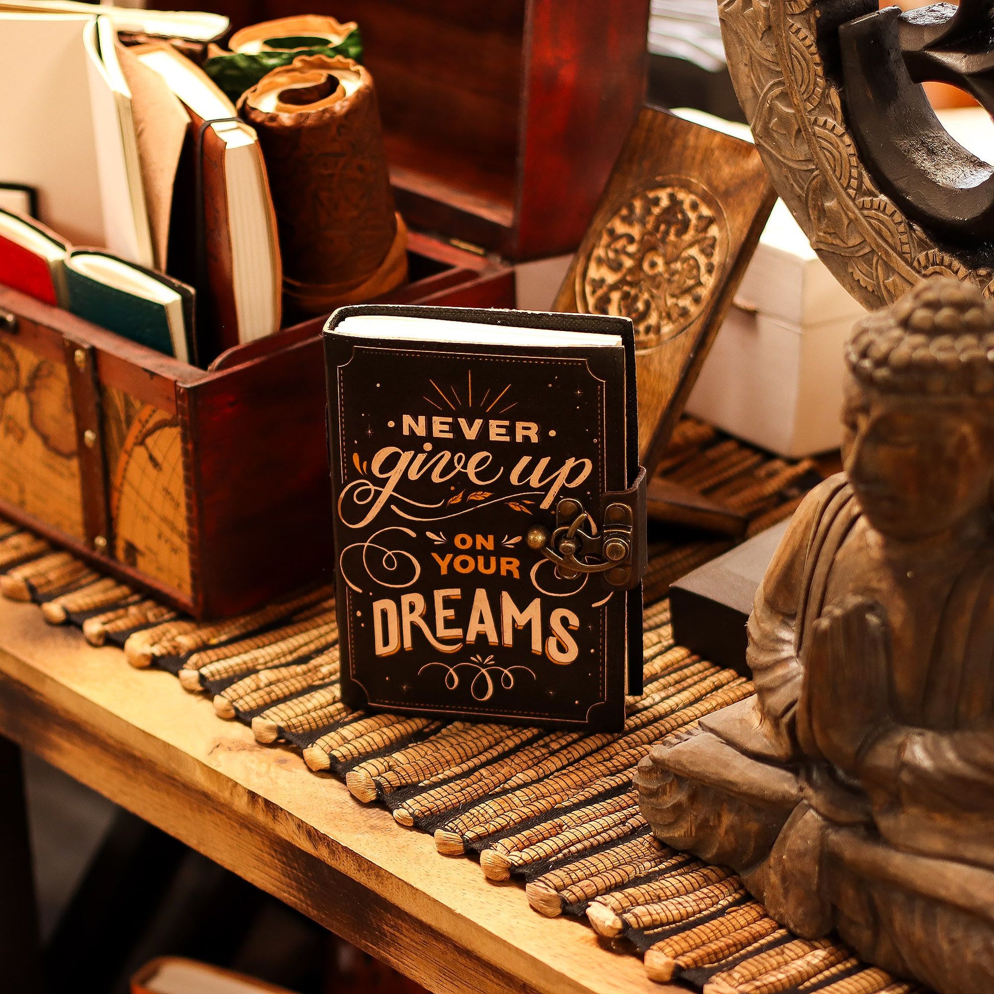 Never Give Up On Your Dreams Leather Journal – deckle edge journal with embossed quote and clasp closure
