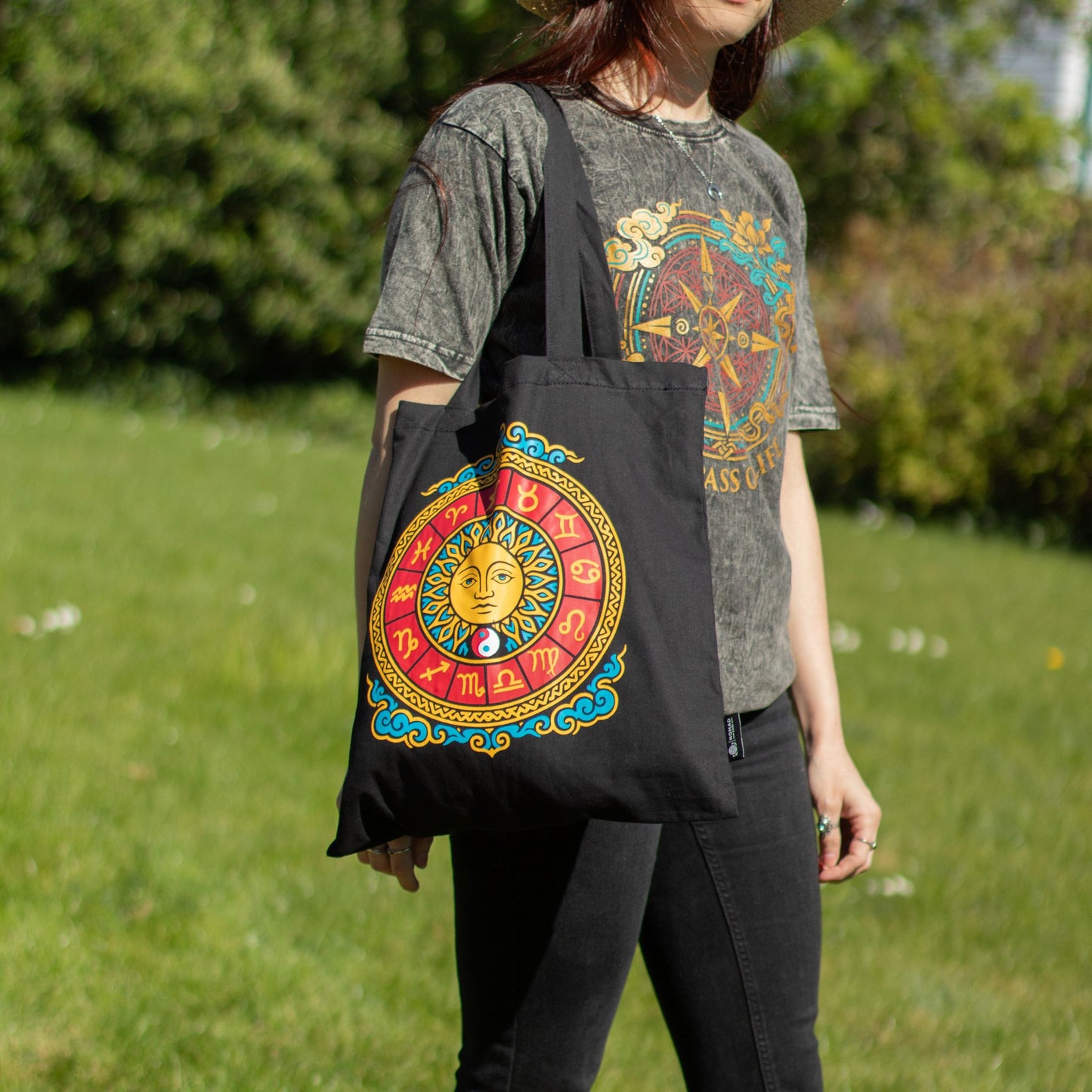 Iconic Classic Zodiac Sun black 6oz cotton tote bag featuring colourful celestial and astrological artwork.