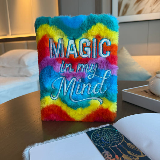 Colourful plush soft dream journal with embroidered Magic in My Mind wording on the cover