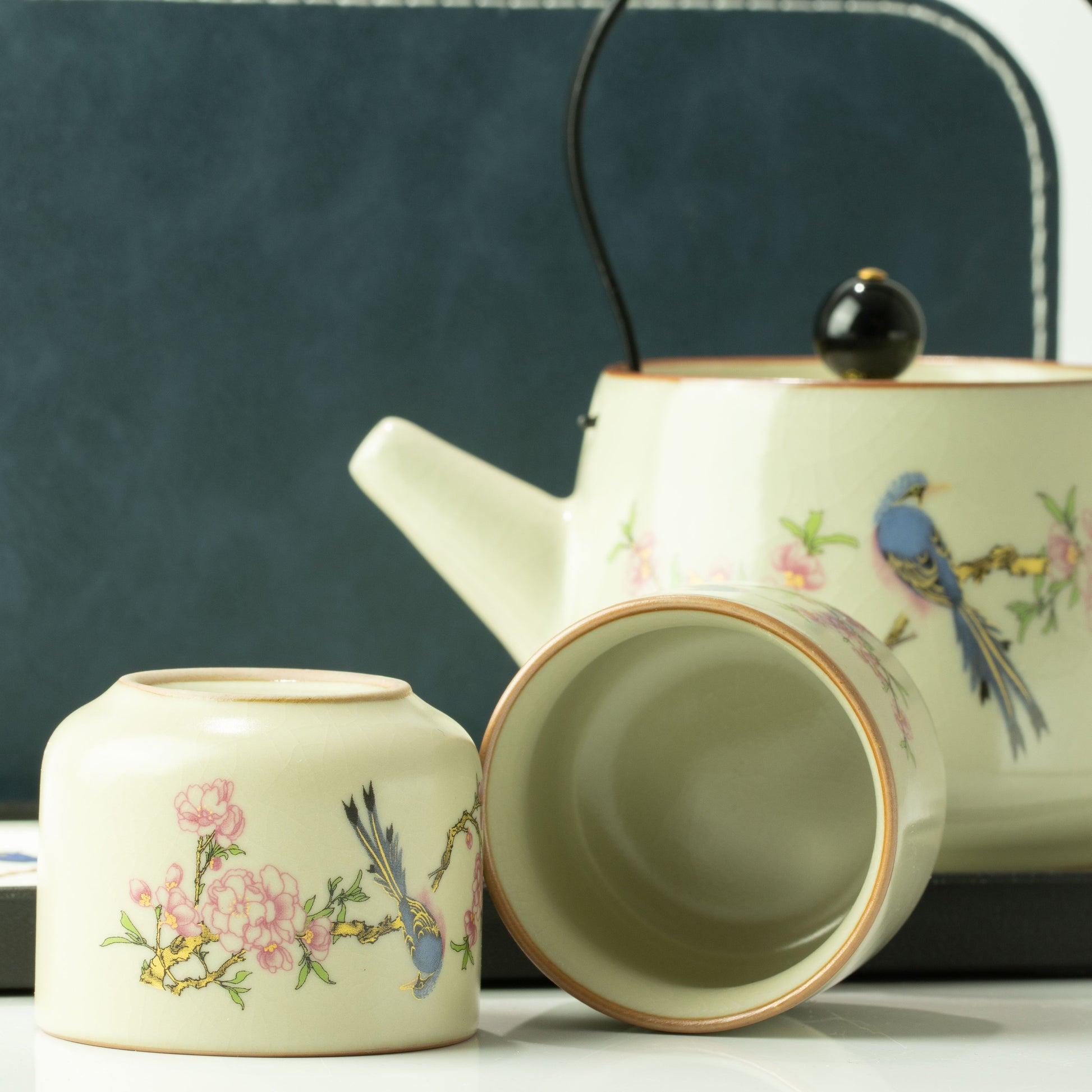 Blue Bird Qing Dynasty travel teapot set with two matching blue bird tea cups
