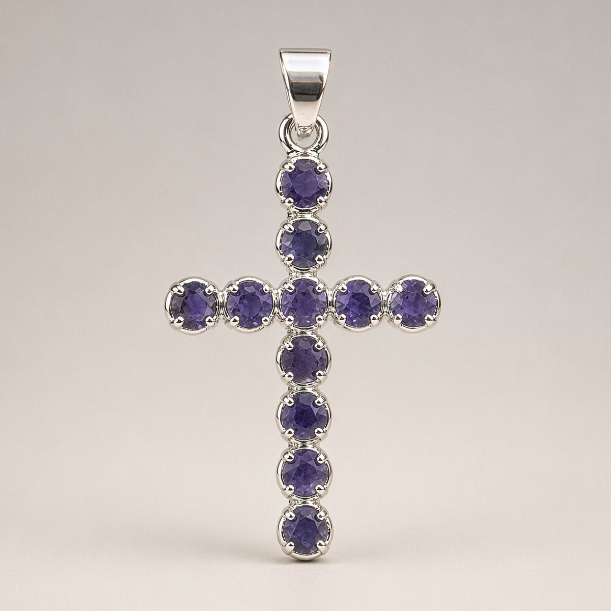 Silver plated Iolite crucifix pendant with faceted blue-violet gemstones and matching 45cm chain for Christian devotional jewellery UK