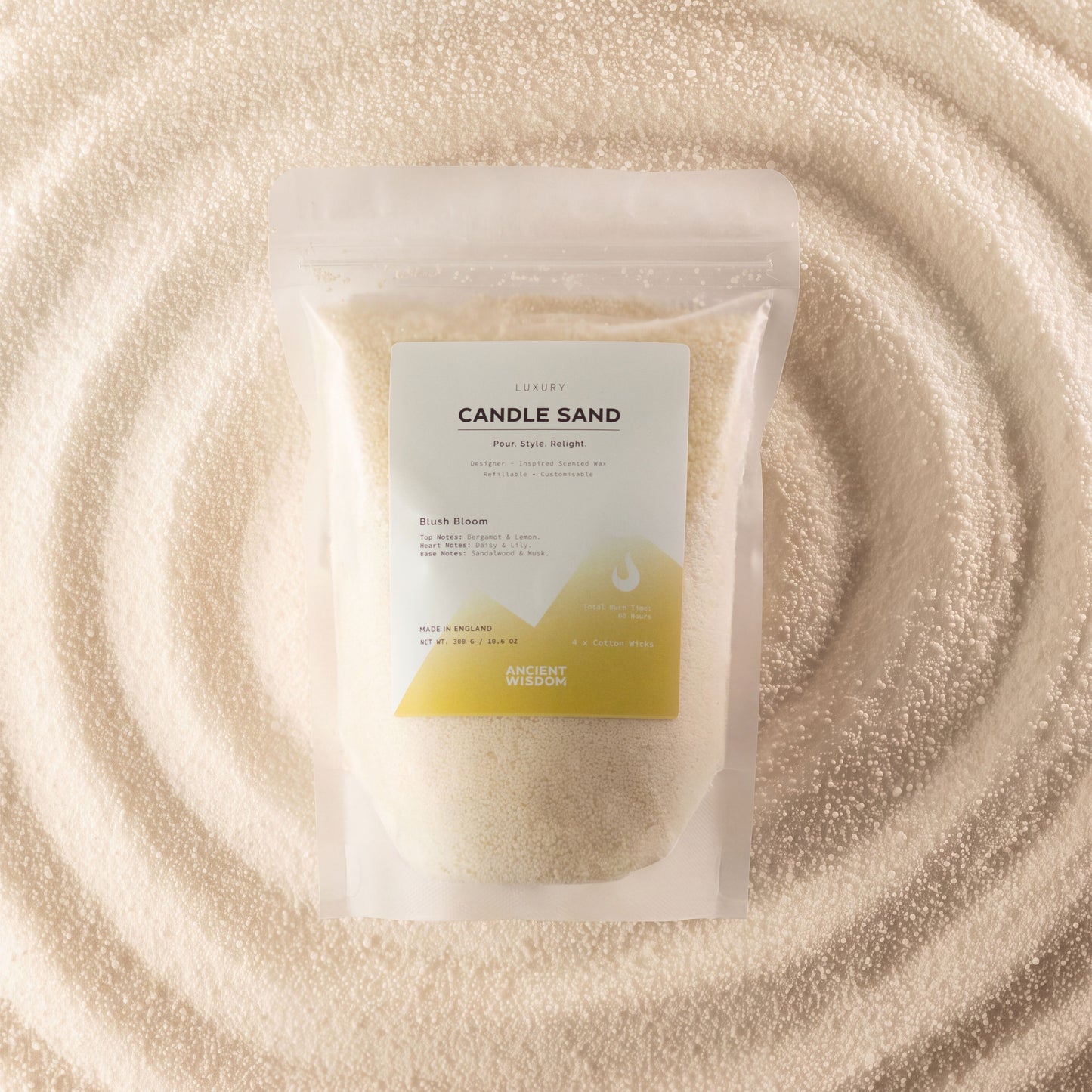 Warm honey Blush Bloom fragranced candle sand with four cotton wicks