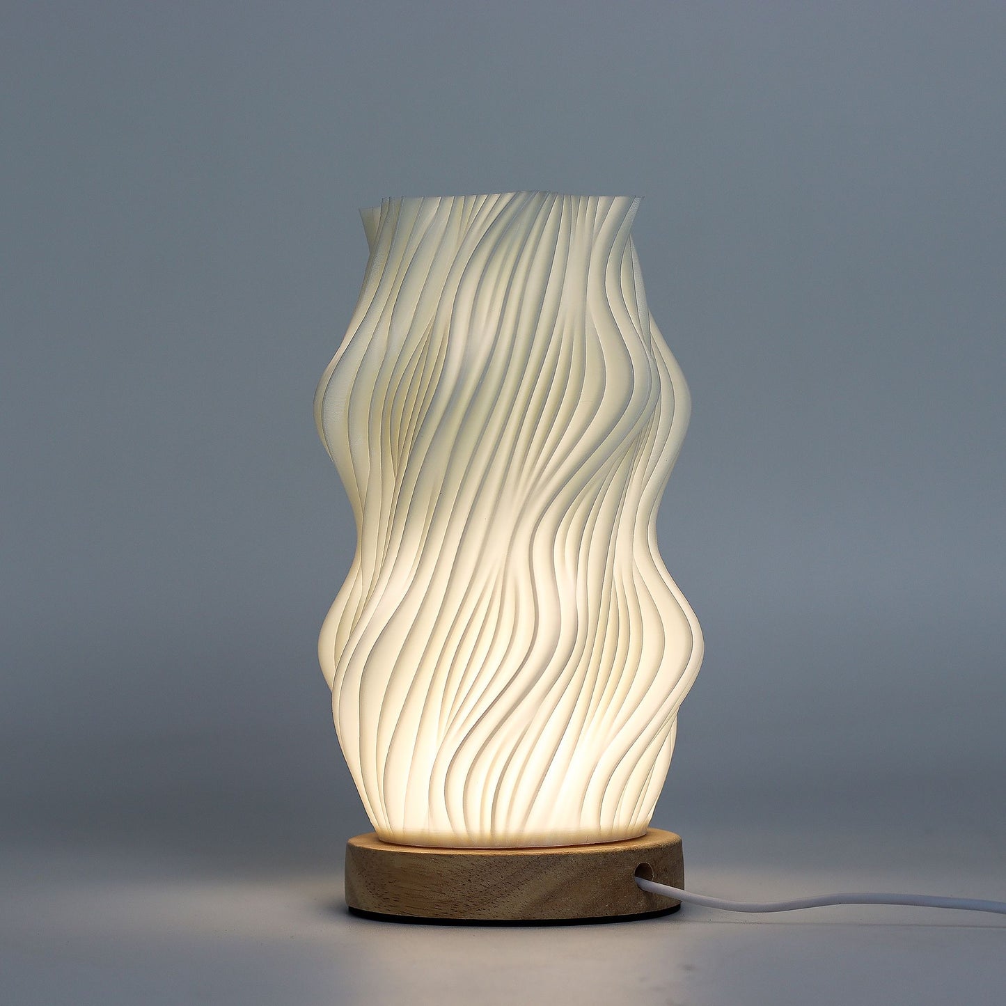 New Wave Lamp – Star Twisted – ambient lamp with modern twisted silhouette and wood-effect base for home lighting UK