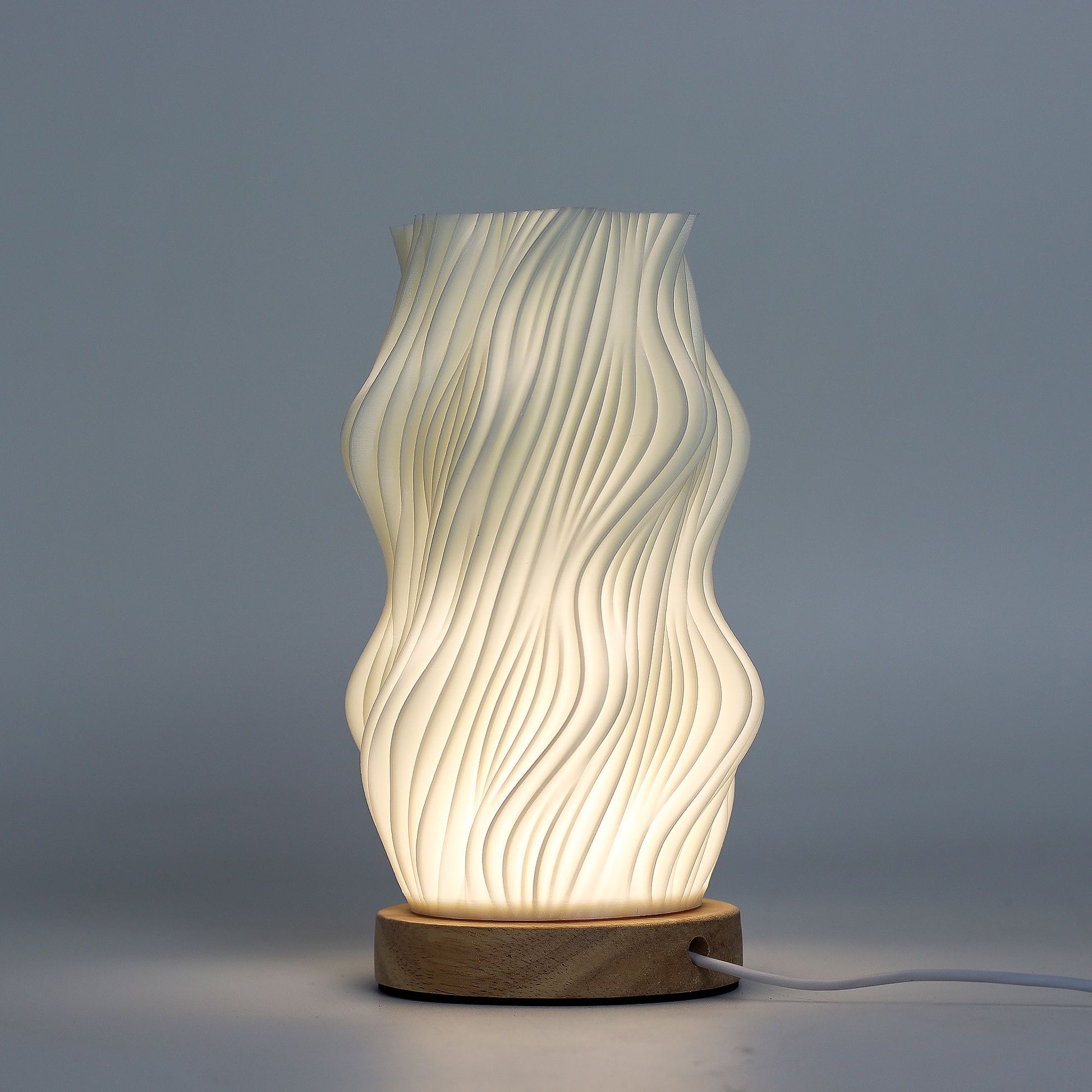 New Wave Lamp – Star Twisted – ambient lamp with modern twisted silhouette and wood-effect base for home lighting UK