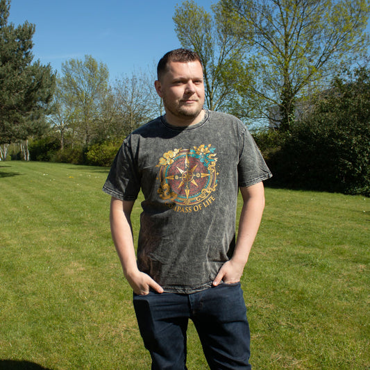 XL Nomad Sari Stonewashed Cotton T-Shirt in charcoal with Compass of Life design and soft double stonewashed finish.
