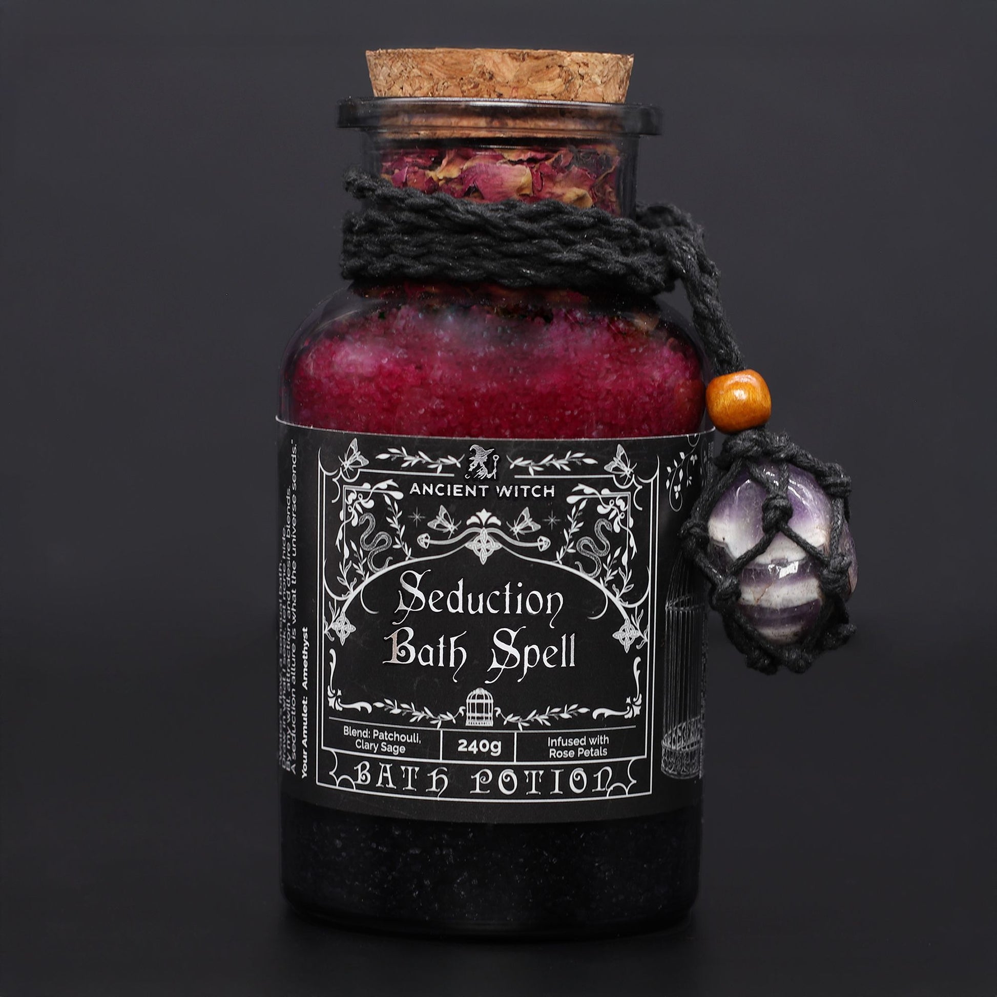 Ancient Witch Seduction Bath Spell Potion with Amethyst Crystal Amulet in glass bottle for ritual bath and seductive energy