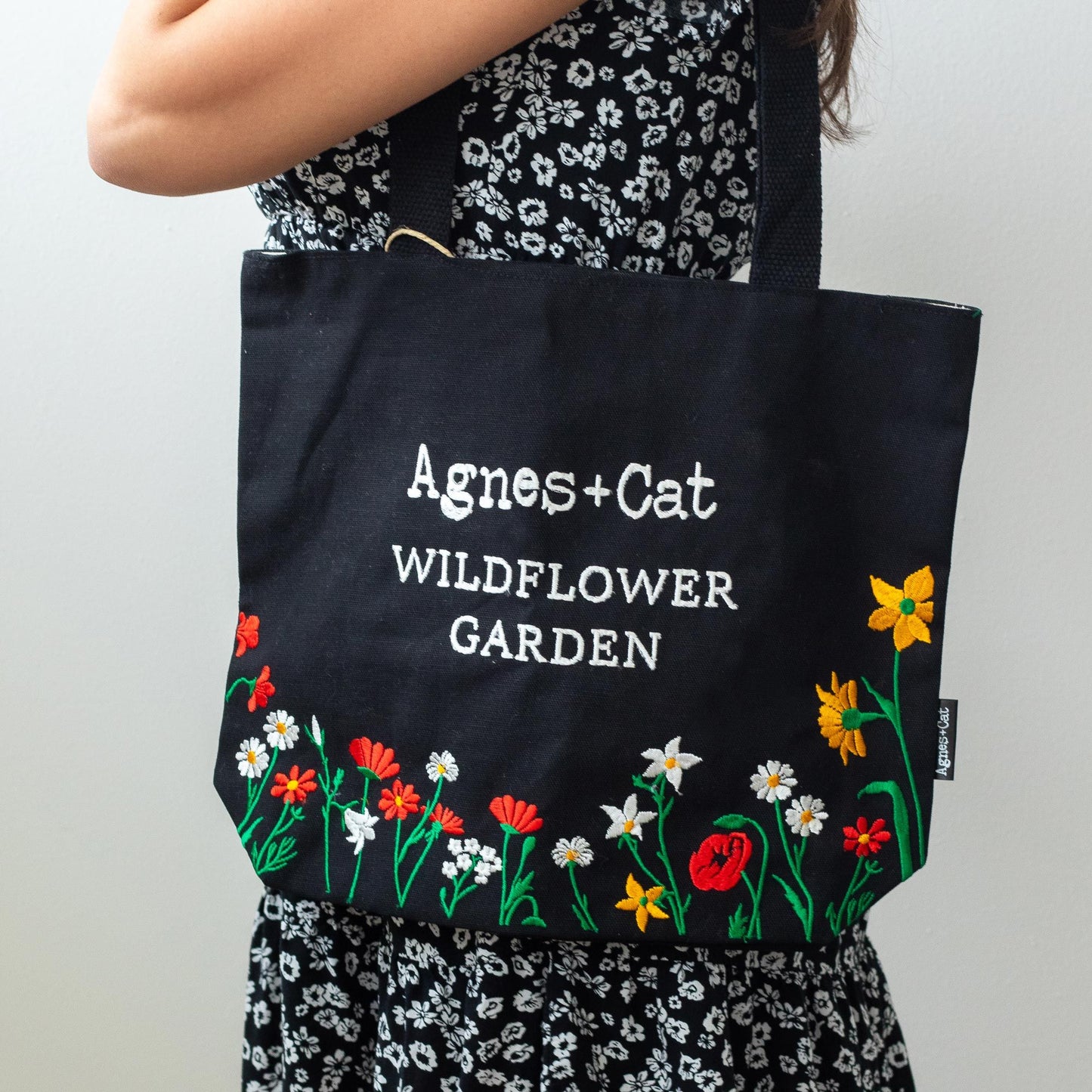 Agnes and Cat wildflower garden tote bag black embroidered cotton floral design