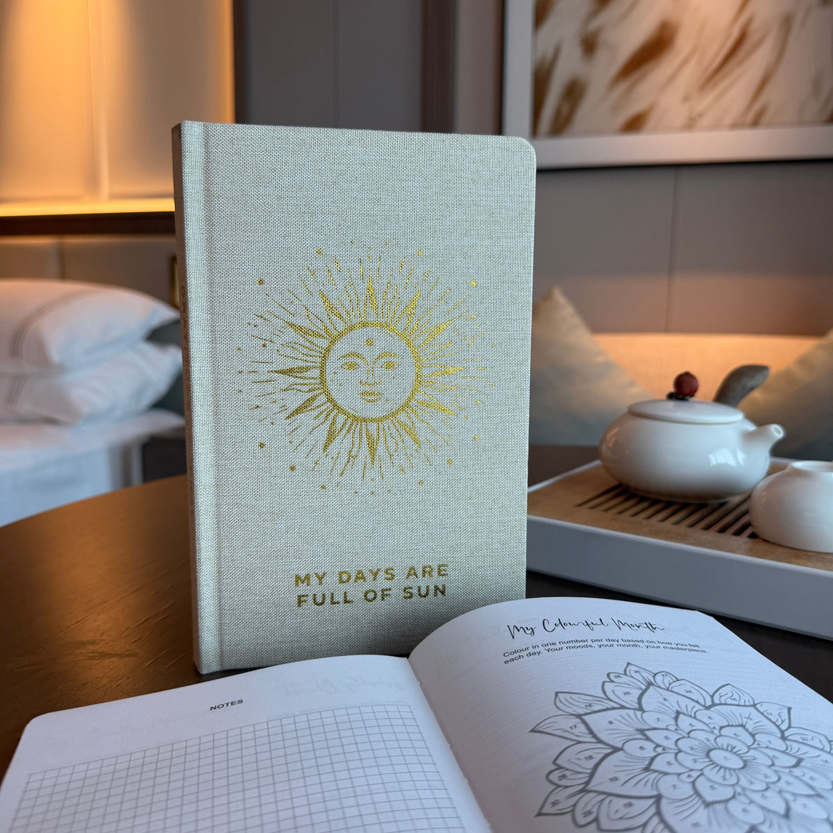 Ivory gratitude journal with gold detailing and My Days Are Full of Sun wording on the cover