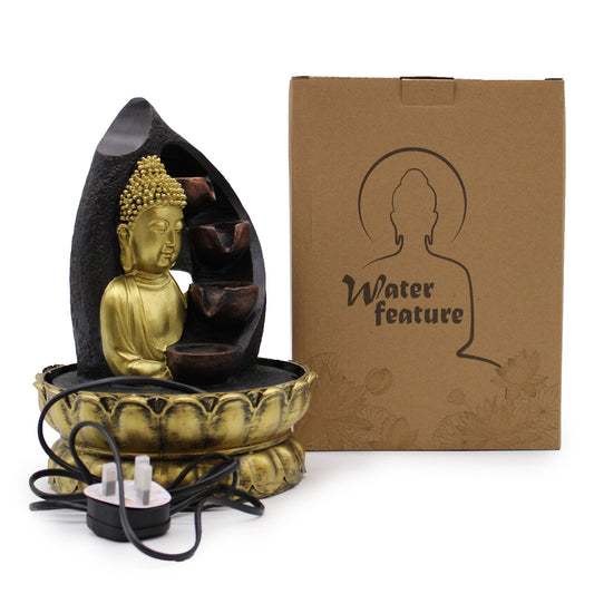 Golden Buddha pouring pots tabletop water feature with gentle flowing water
