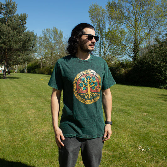 Small Nomad Sari Stonewashed Cotton T-Shirt in green with Tree of Life and ouroboros design on soft double stonewashed cotton.
