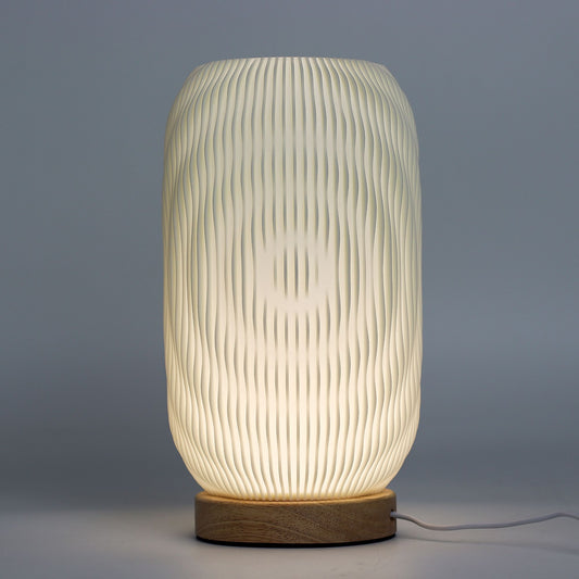 New Wave Lamp – Modern Twisted – minimalist ambient lamp with twisted silhouette and wood-effect base for contemporary home lighting UK