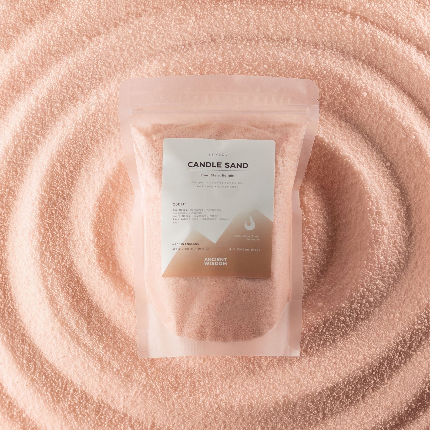 Taupe orange Cobalt fragranced candle sand with four cotton wicks