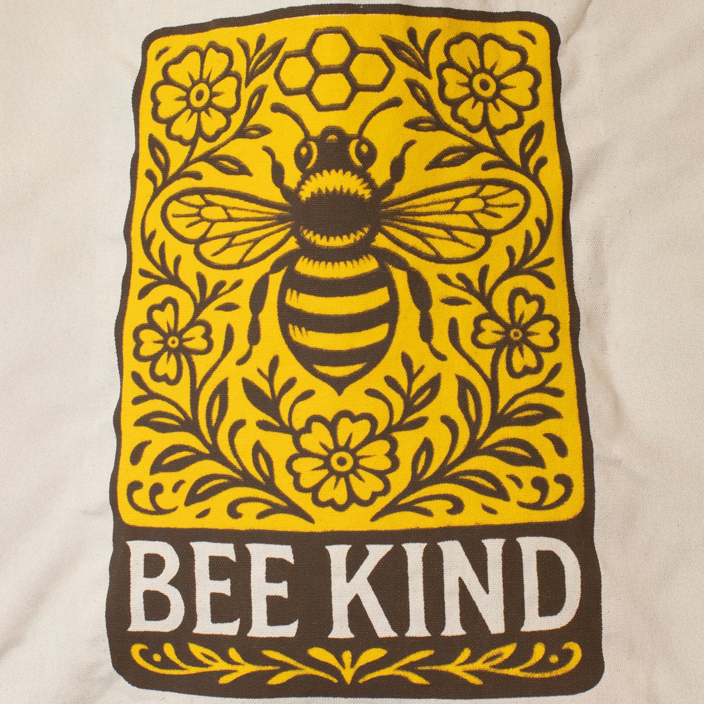 Nomad Sari Bee Kind natural 10oz cotton canvas tote bag with zip closure and internal pocket.