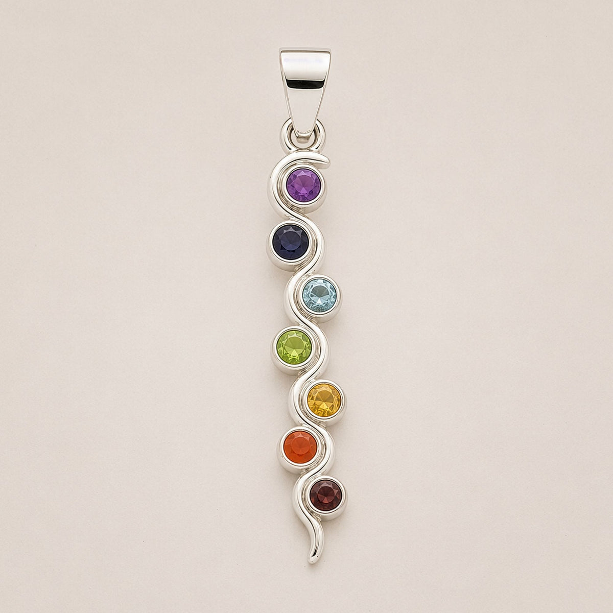 Silver plated Snake Chakra pendant with coiled serpent design, seven coloured chakra gemstone accents and 45cm black cord for spiritual jewellery UK