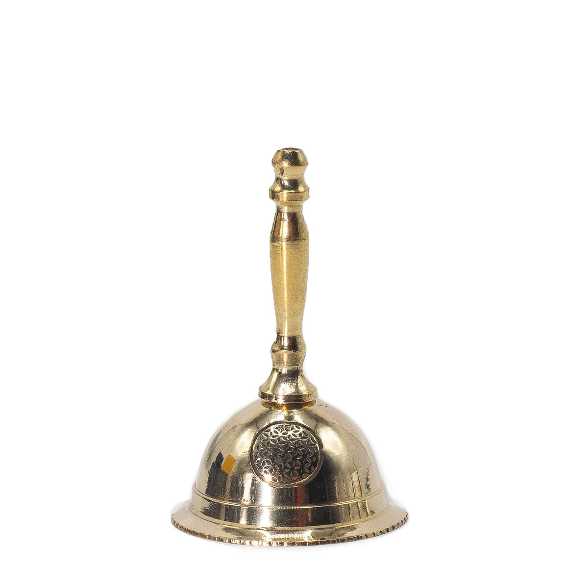 Small handcrafted brass altar bell featuring the Flower of Life symbol for rituals and meditation.