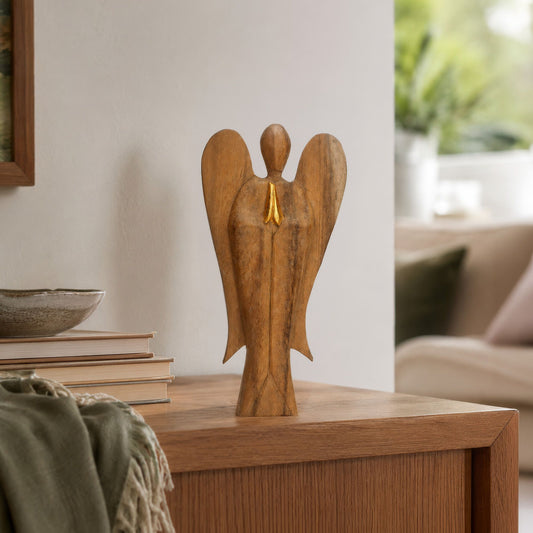 Hand-carved Hati Hati Friendship angel in Suar wood with gold-painted details and natural wood grain
