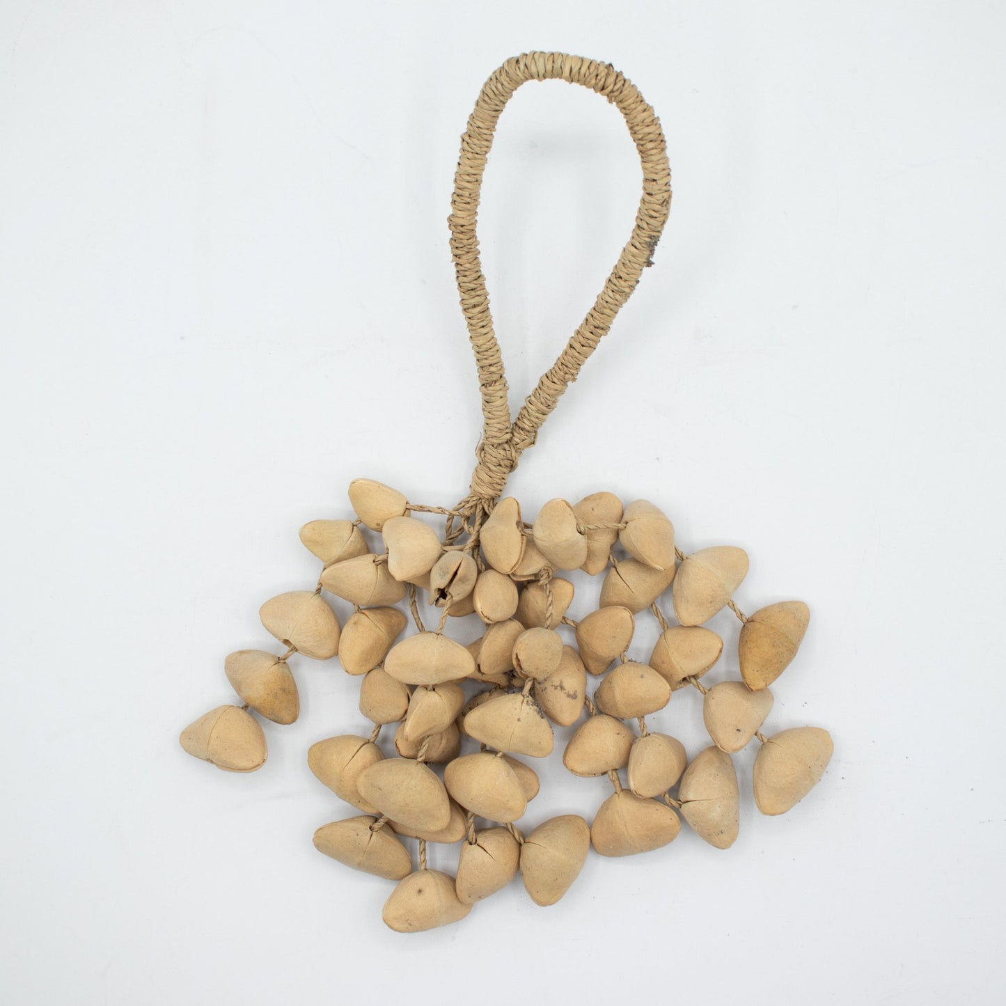 Kenari Shell Long Rattle with 50 natural Indonesian Kenari nut shells for meditation, sound healing and percussion.