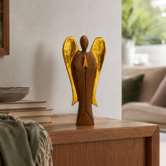 Hand-carved Hati Hati Guardian angel in Suar wood with painted detailing and natural wood grain