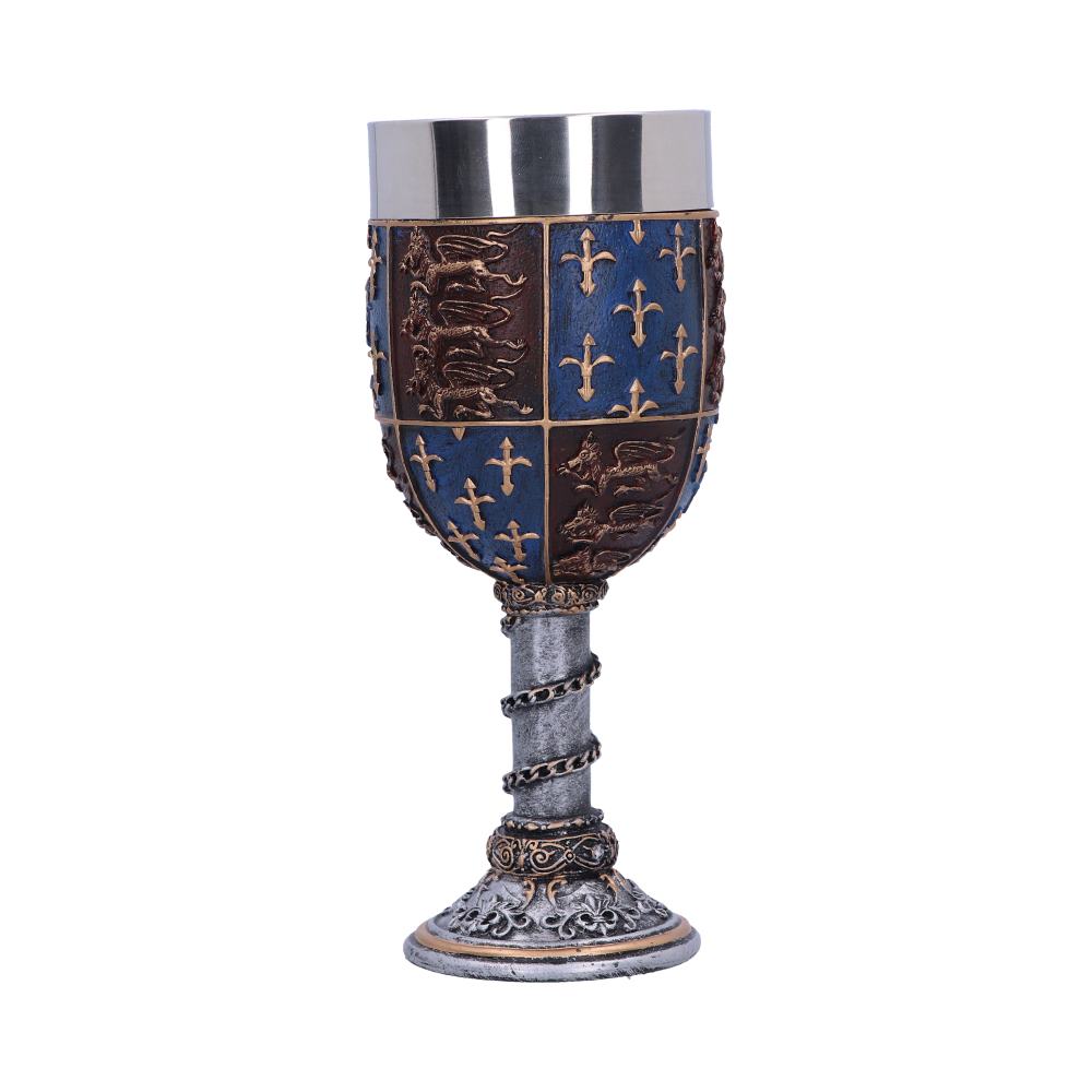 A medieval-style goblet stands centered on a white backdrop. The cup has a silver rim and a patterned body with alternating gold crosses and gold lions. Its silver stem has a spiral chain wrapped around it.