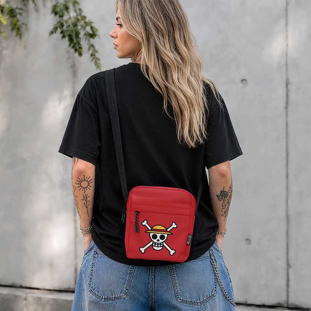 One Piece Luffy Jolly Roger Crossbody Bag Red - Red Jolly Roger bag worn with a dark top and jeans