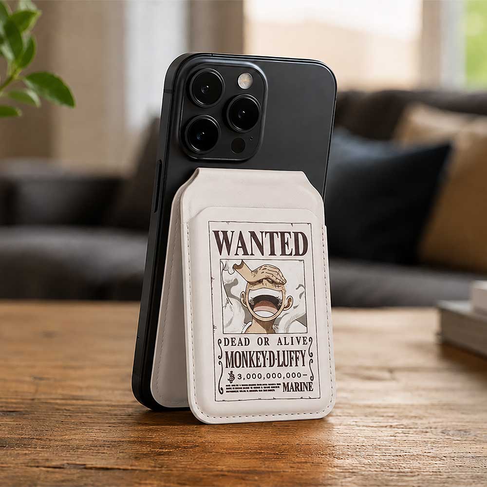 One Piece Luffy Wanted Poster MagSafe Card Holder - Luffy poster holder attached to phone on wooden table