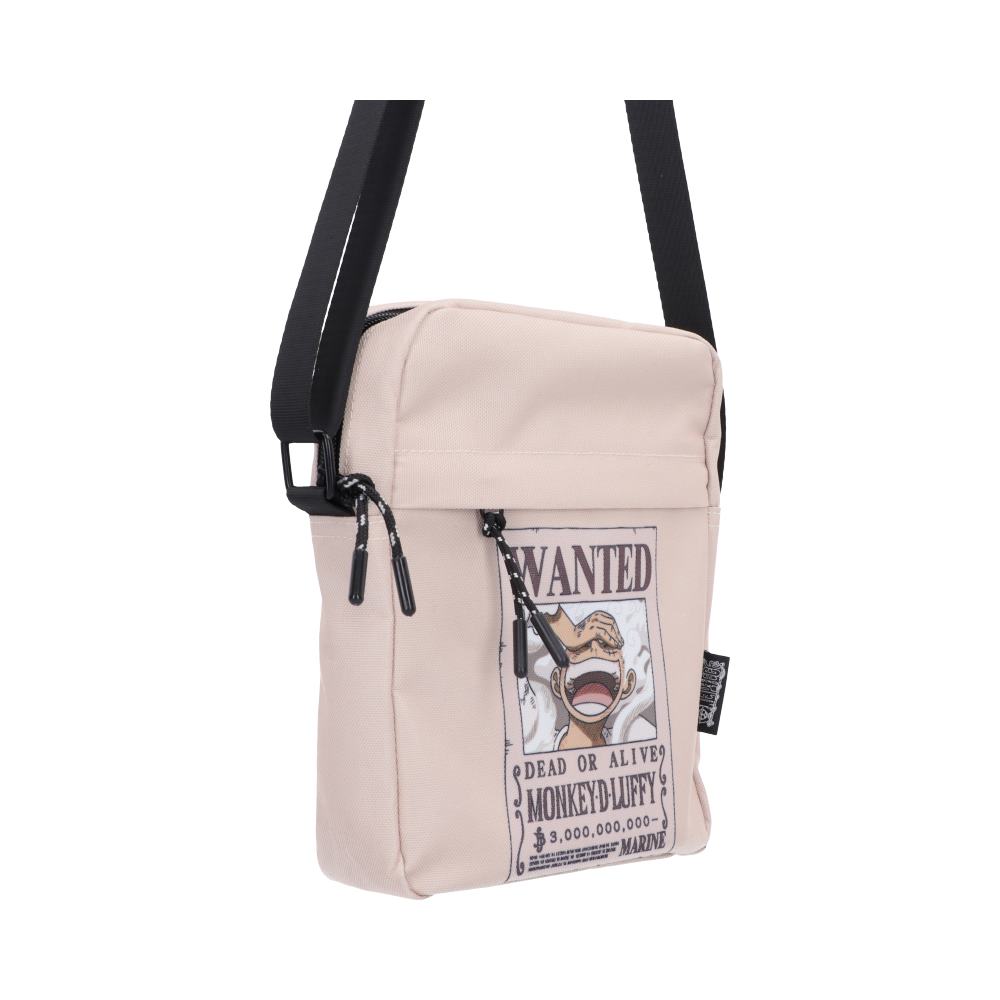 One Piece Luffy Wanted Poster Crossbody Bag - Side view of cream body and zipped front panel