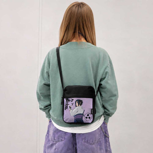 Naruto Sasuke Crossbody Bag - Sasuke bag worn with a green top and purple trousers