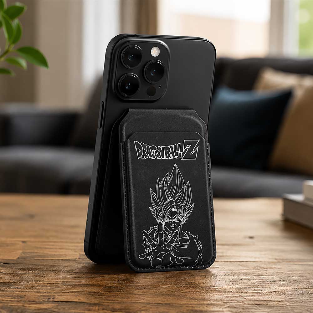 Dragon Ball Z Super Saiyan Goku MagSafe Holder Black - Monochrome Goku holder attached to phone on wooden table