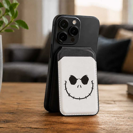 Nightmare Before Christmas Jack MagSafe Card Holder - Jack-face card holder attached to a phone on a wooden table