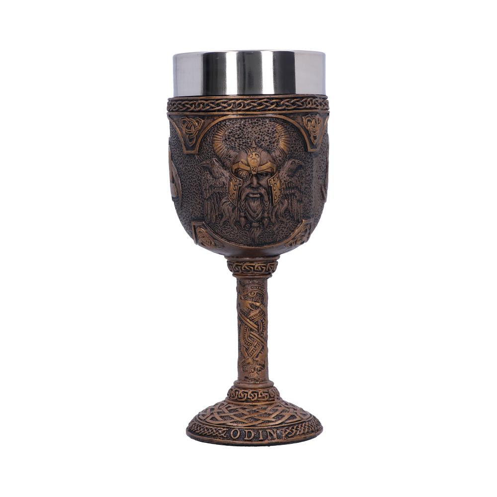 An ornate, bronze-colored goblet with a stainless steel top stands on a white background. The goblet features a relief of Odin’s face and the word “ODIN” on the base.