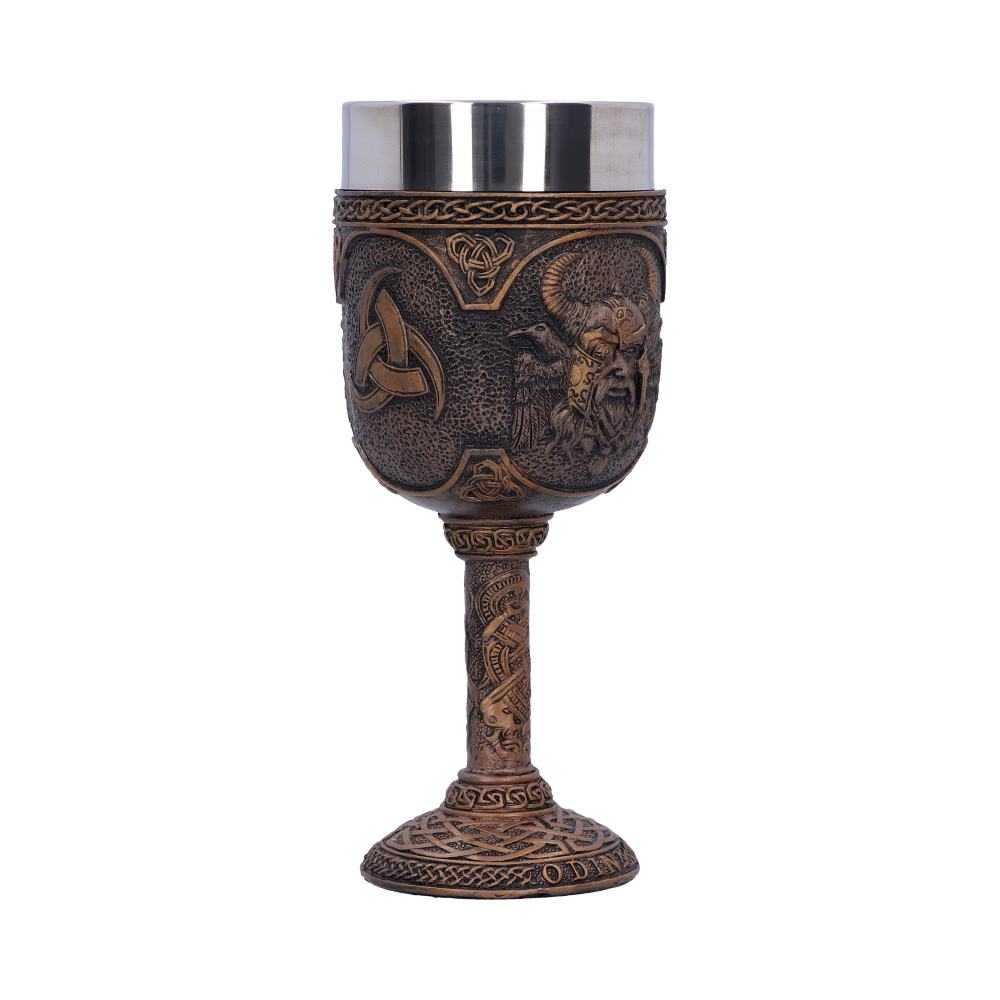 A metal goblet is standing; it is decorated with a Celtic knot and images of Odin. The base of the goblet is inscribed "ODIN." It is on a white background.