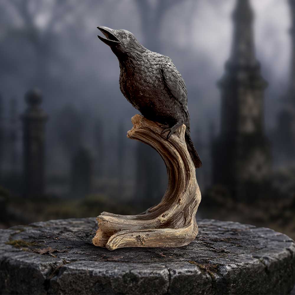 Raven’s Caw Raven Ornament - raven on its perch in a woodland-themed setting