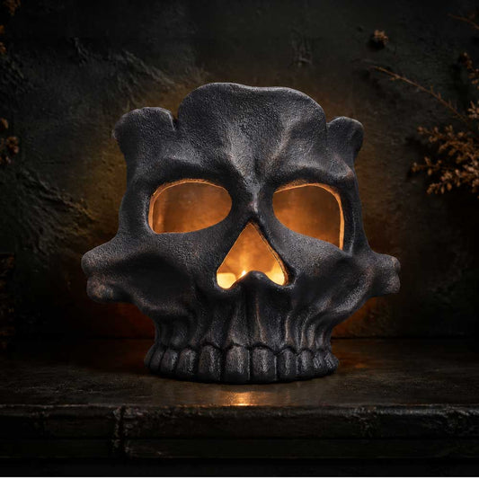 Afterglow Black Skull Tea Light Holder - black skull holder lit from within by a tea light