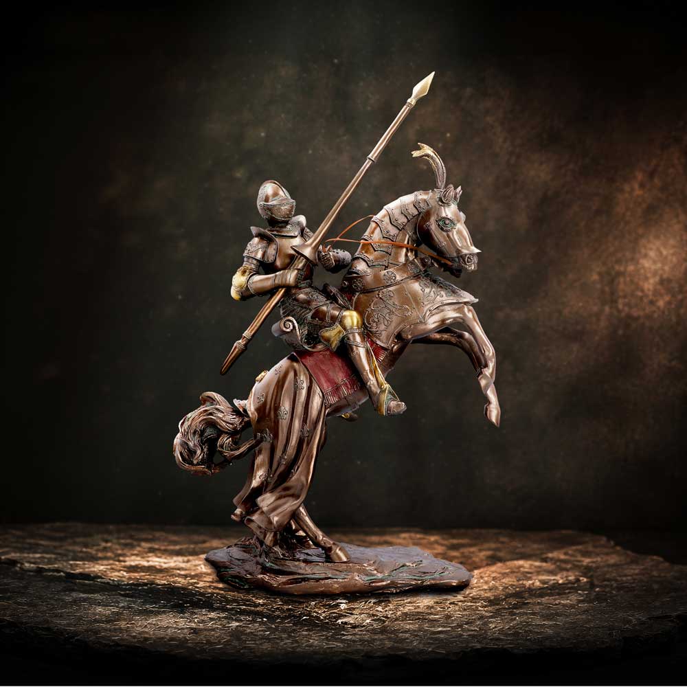 Knight’s Charge Mounted Knight Figurine - mounted knight displayed in a dramatic medieval setting