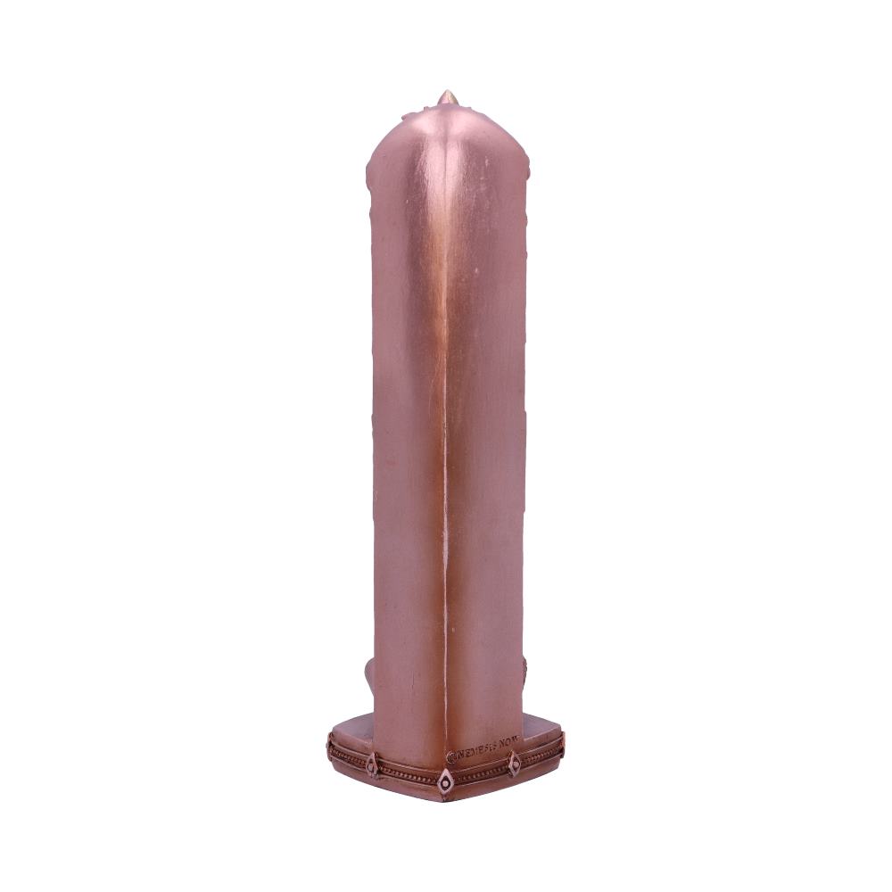 A rose gold-colored candle stands upright against a white background.  ©NEDIS 2017 is inscribed on the base.
