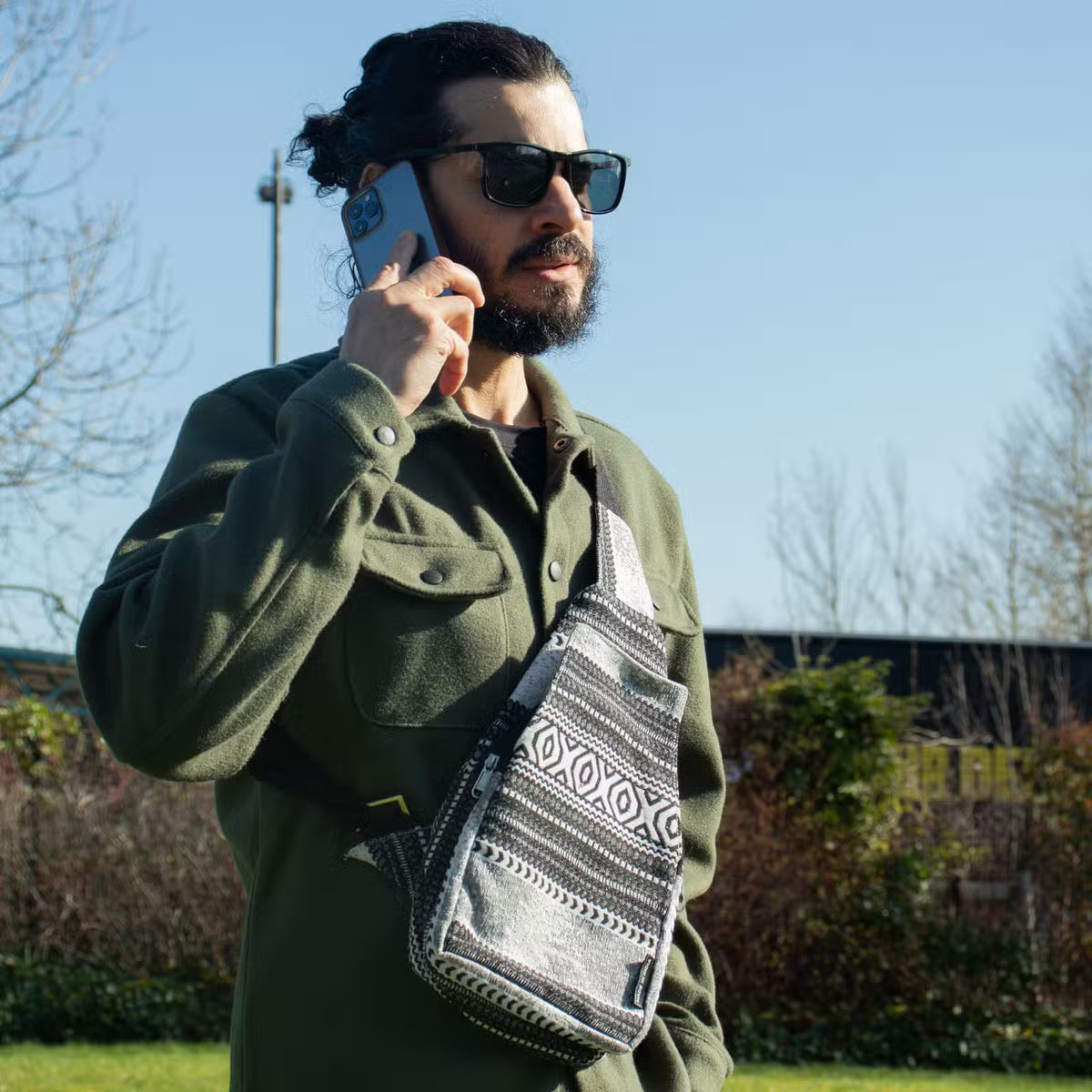Urban Caravan crossbody bag in black and natural cotton-viscose jacquard with bold geometric woven pattern