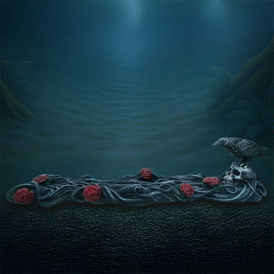 Twilight Bloom gothic raven incense burner by Nemesis Now with black raven perched on a skull, vivid red roses and twisted branch detailing