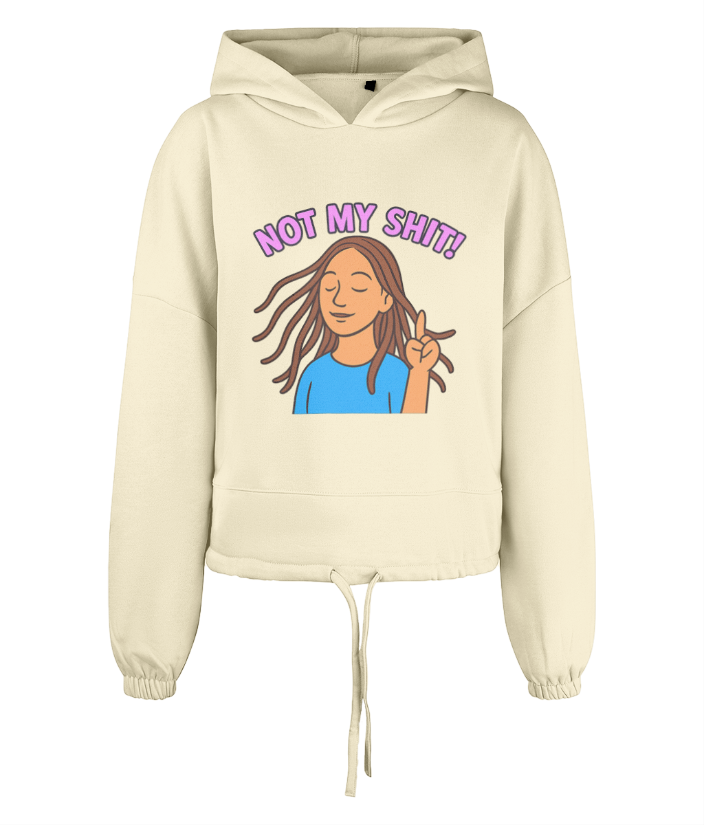 Hoodie displaying an illustrated woman flipping a peace sign with eyes closed and hair blowing, captioned "NOT MY SHIT!", centered on a cream cropped drawstring hoodie against black background.