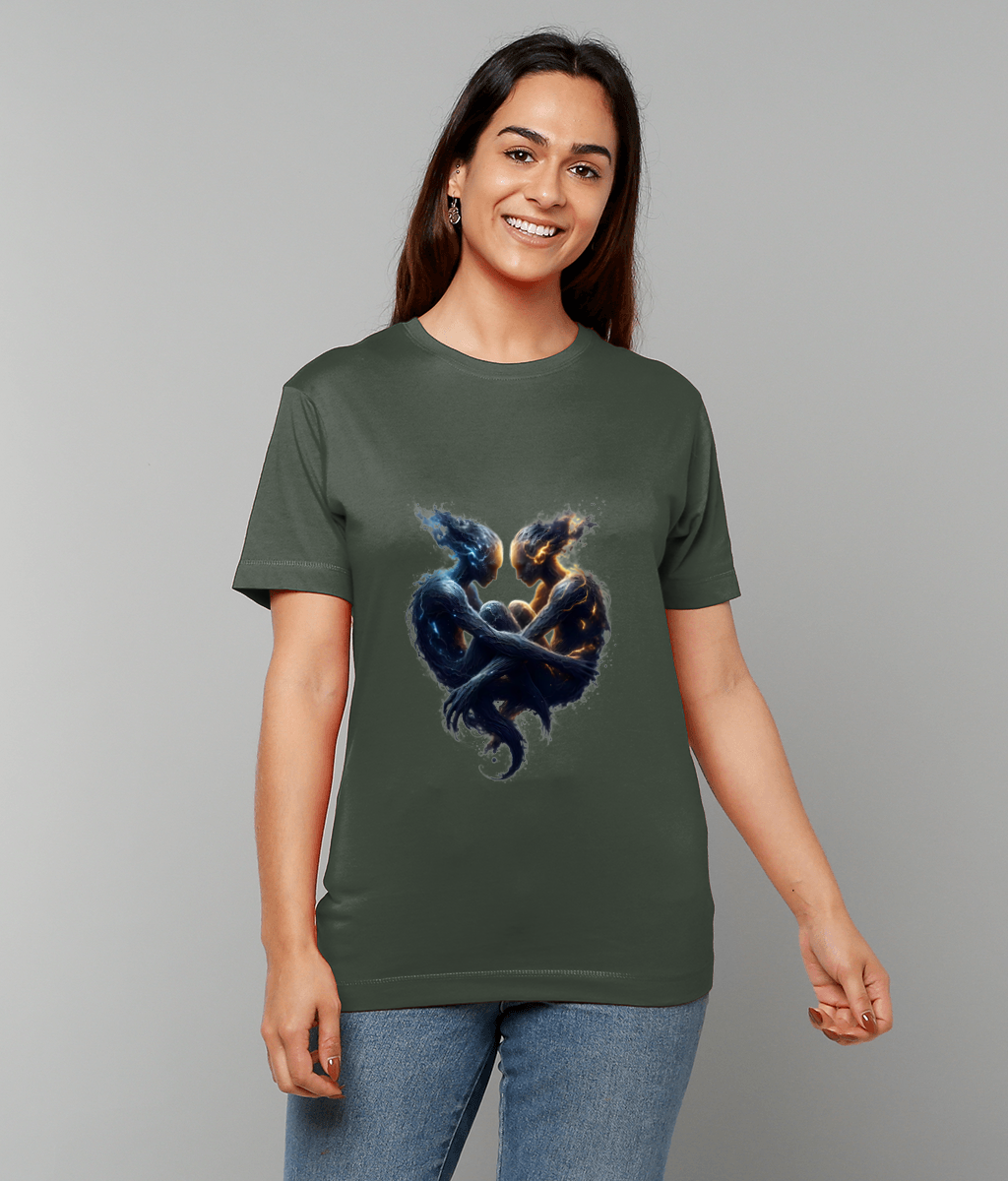 T-shirt shows two entwined glowing humanoid figures forming a heart shaped yin-yang, one blue one orange, worn by a smiling person standing against a plain light gray background.