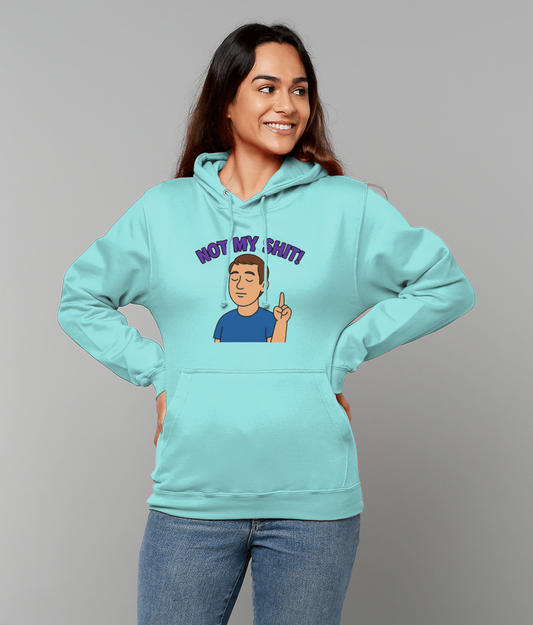 A woman wearing a light turquoise hoodie printed with a cartoon man and the text "NOT MY SHIT!" smiles with hands on hips against a neutral gray background.