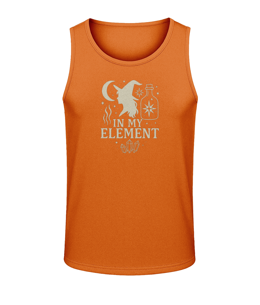 Orange tank top displays a witch silhouette, crescent moon, potion bottle, crystals and stars with the text IN MY ELEMENT centered on the chest against a plain black background.