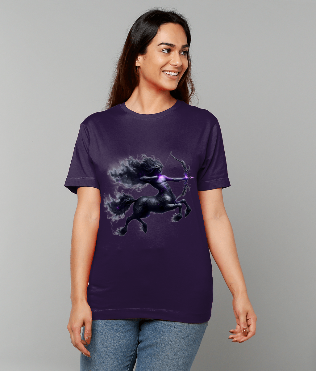 Purple T-shirt displaying a dark centaur archer firing a glowing purple arrow, worn by a smiling woman standing relaxed against a plain light gray background.