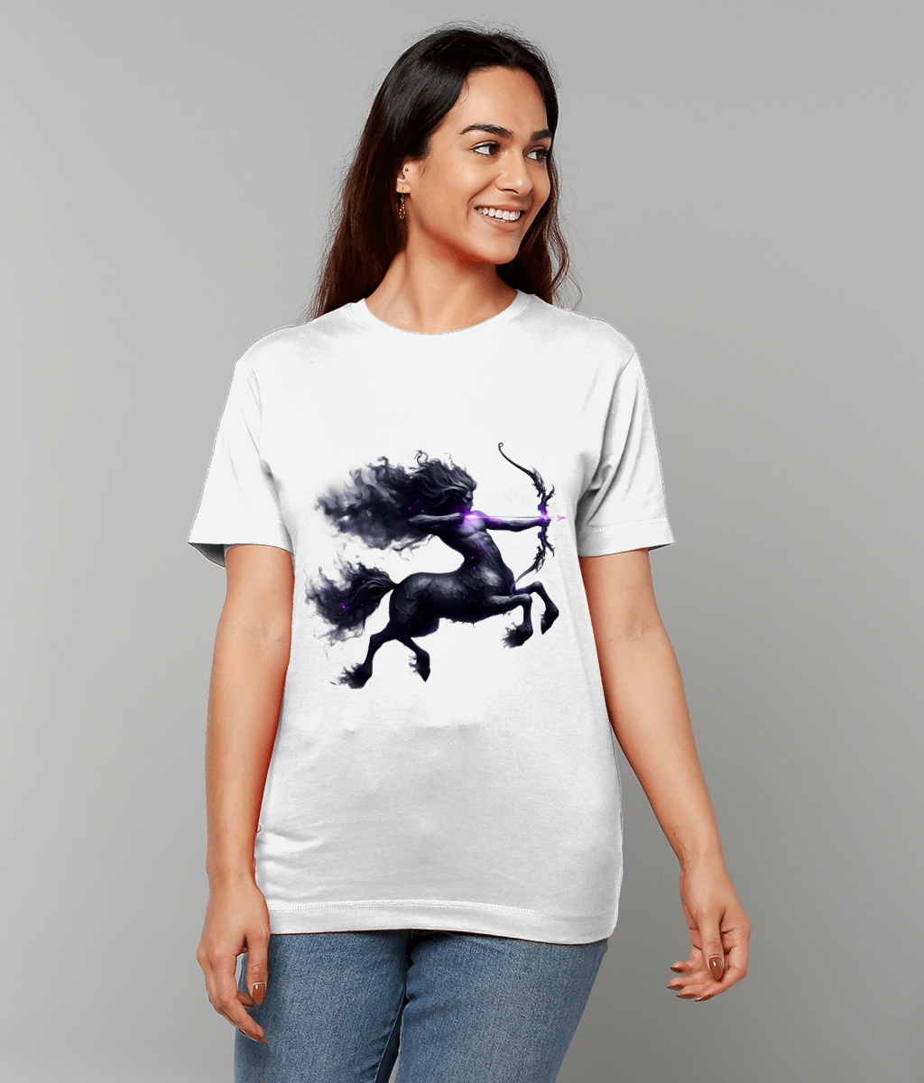 Woman wearing a white T-shirt featuring a dark ethereal centaur archer drawing a glowing purple arrow, the design centered on the shirt against a neutral gray studio background.